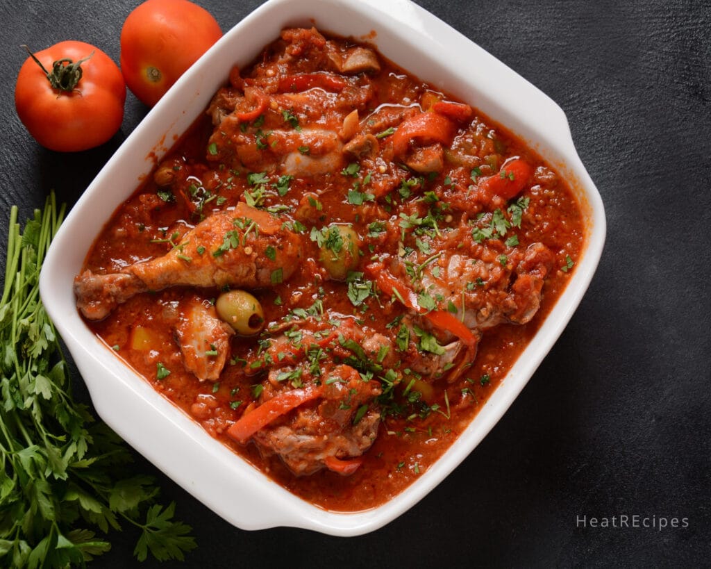 Cacciatore chicken cooked with tomato sauce